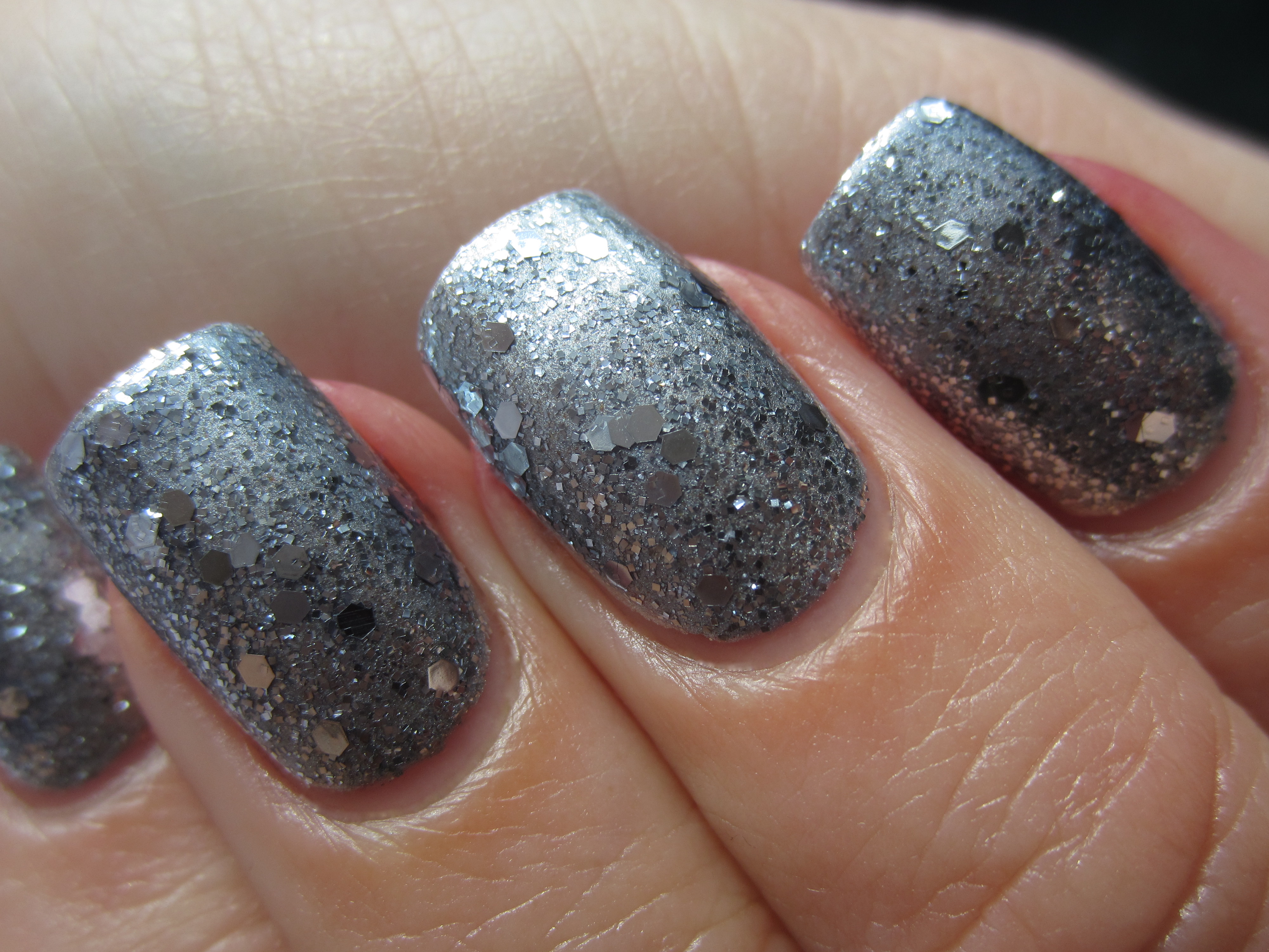 Louboutin nails closeup (indoors)