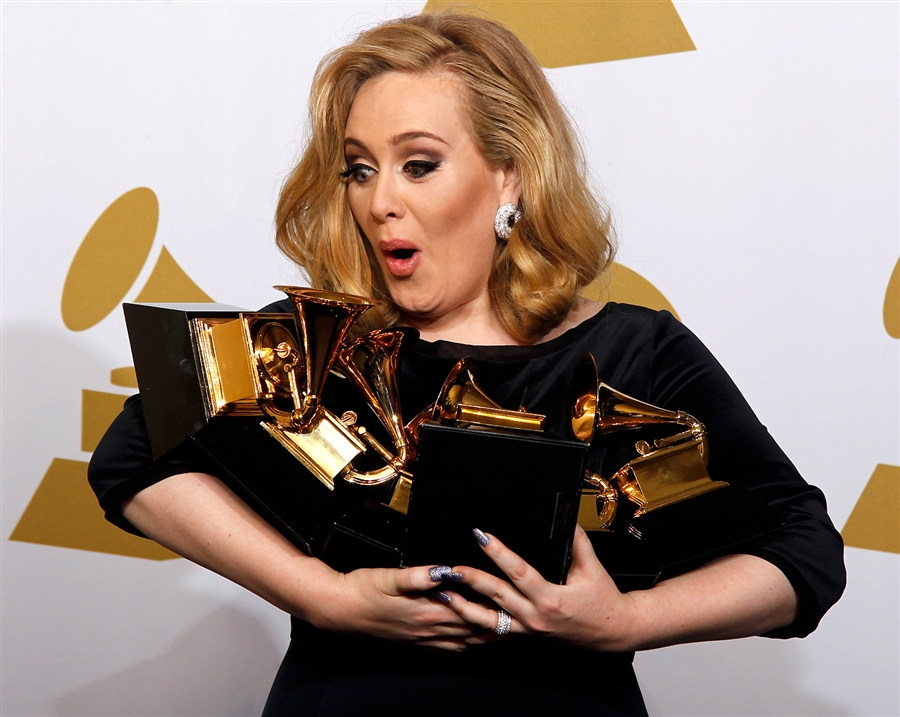 Adele & her awards at the 54th Grammys