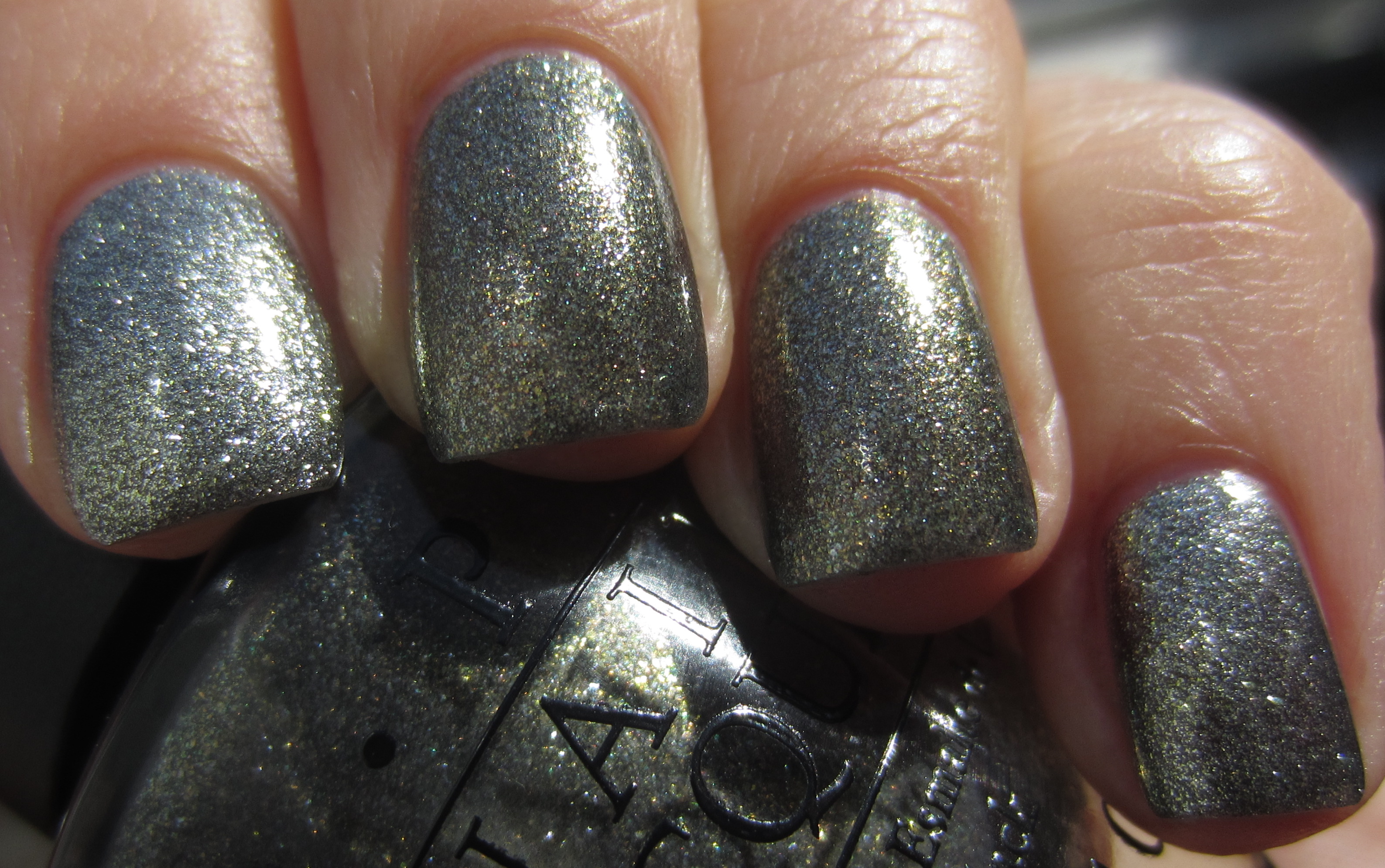 Number One Nemesis vs Graphite swatch (sunlight 2)