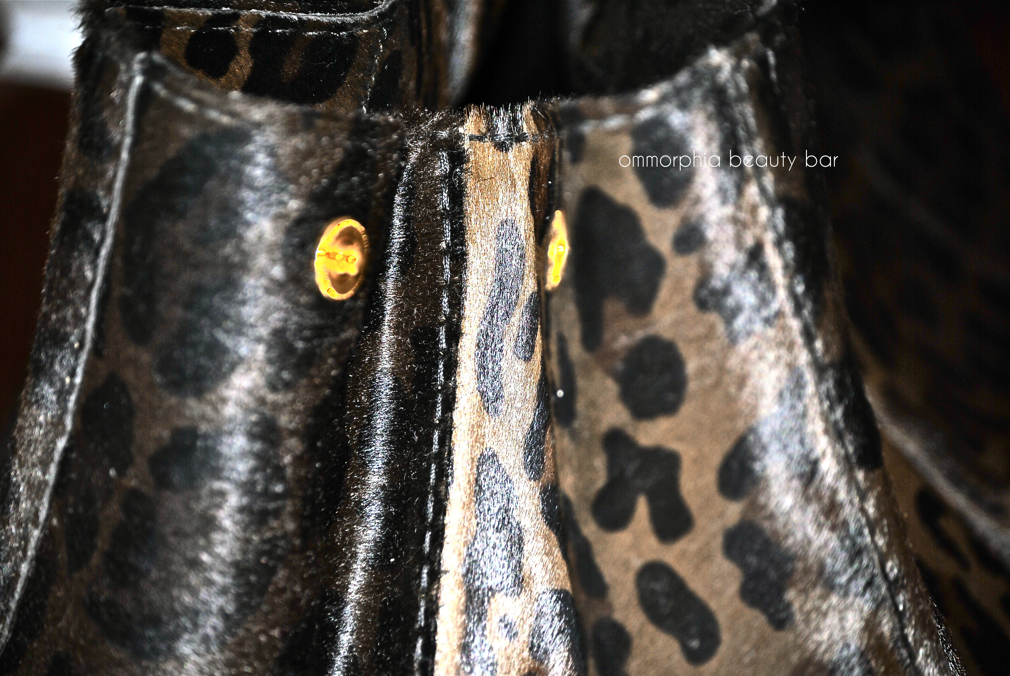Prada Cavallino side snap closure