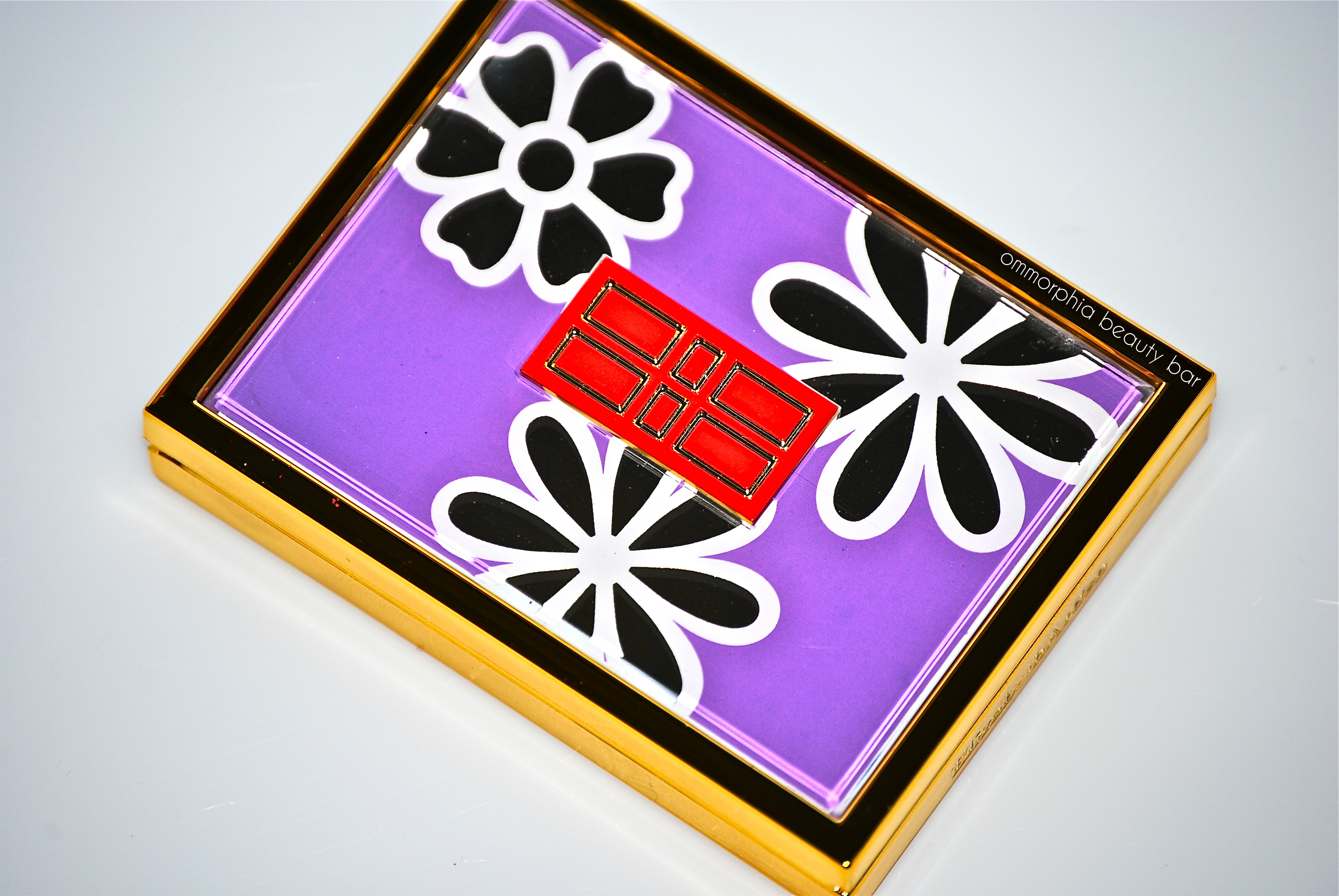 EA Violet Bloom compact