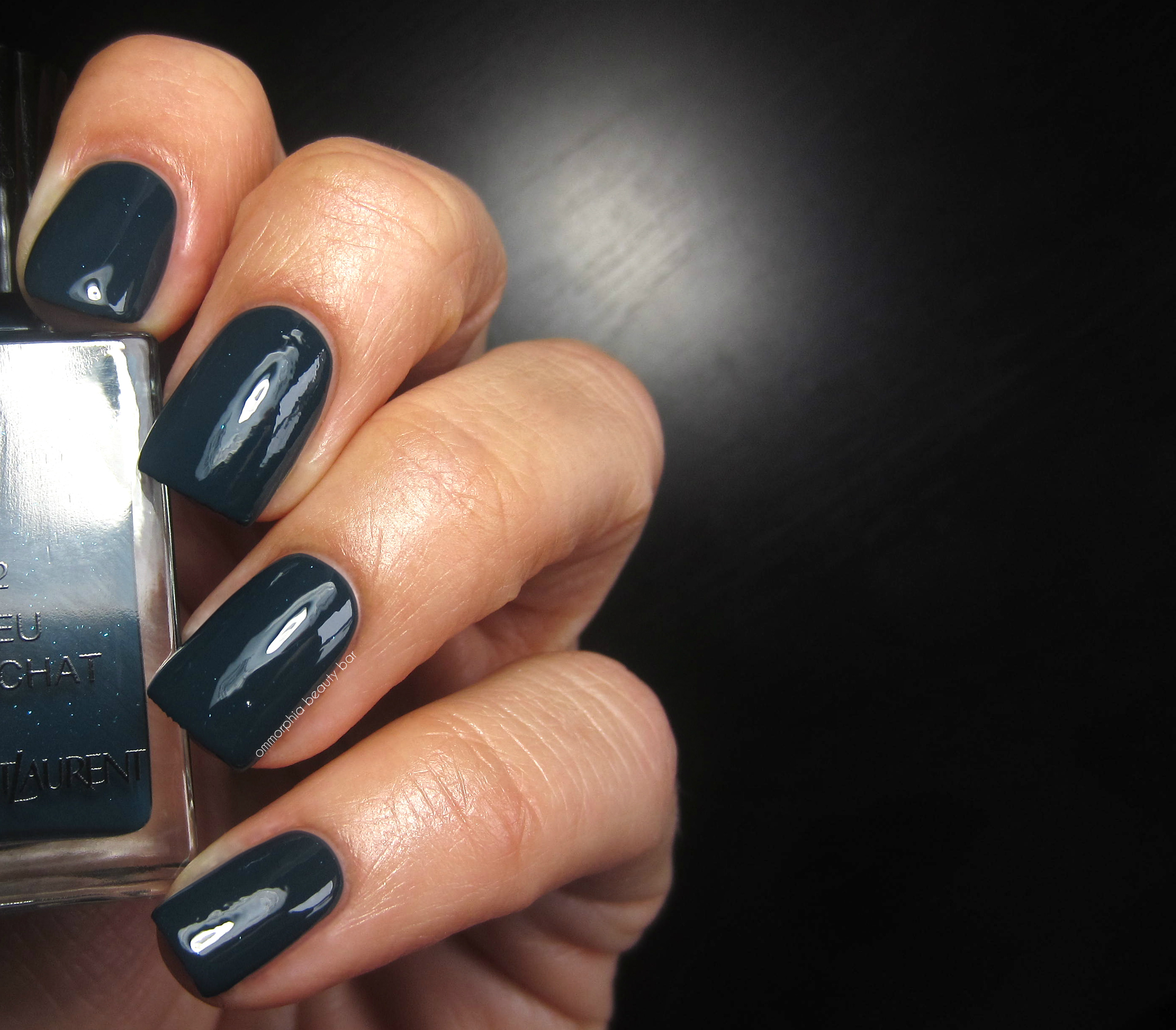 YSL #52 Bleu Galuchat swatch with top coat